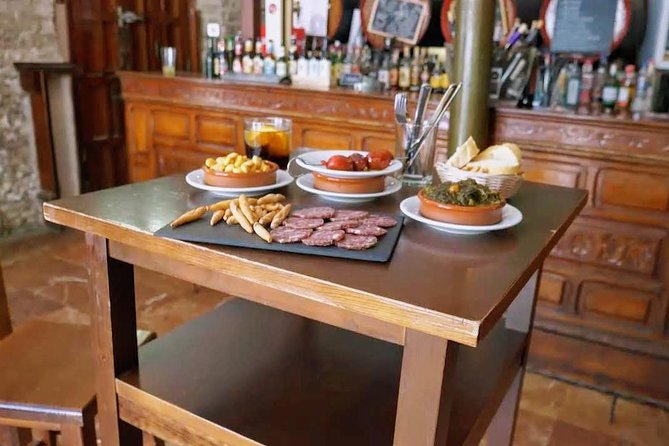 Sevilla Food Tour: Tapas, Wine, History & Traditions - Alfalfa Streets and a Small Tavern With Tostas and Montaditos
