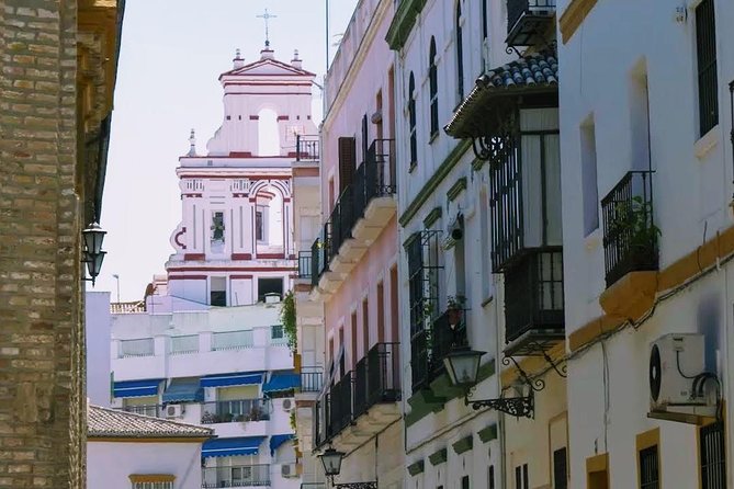 Sevilla Food Tour: Tapas, Wine, History & Traditions - Los Soportales: Chicharrones, Montaíto, and Beer on Tap