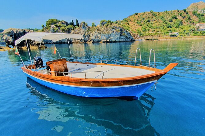 Sicilian wine tasting on the boat in Taormina - Lido Mazzarò: elegant coastline with caves and quick swim time
