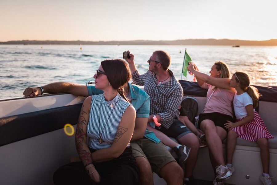 Sirmione: Sunset Boat Cruise with Local Wine - Getting There Right: Piazzale Porto, the Blue Umbrella, and Not Missing the Boat