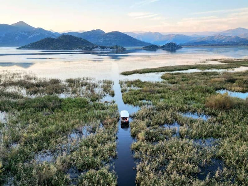 Skadar Lake: Guided Sunset Boat Tour with Wooden Boat & Wine - Golden Hour on Lake Skadar: When the Lake Looks Like It Was Made for Pictures