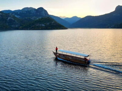 Skadar Lake: Guided Sunset Boat Tour with Wooden Boat & Wine - National Park Stops and Wildlife Time (Reeds, Channels, and Gorice)