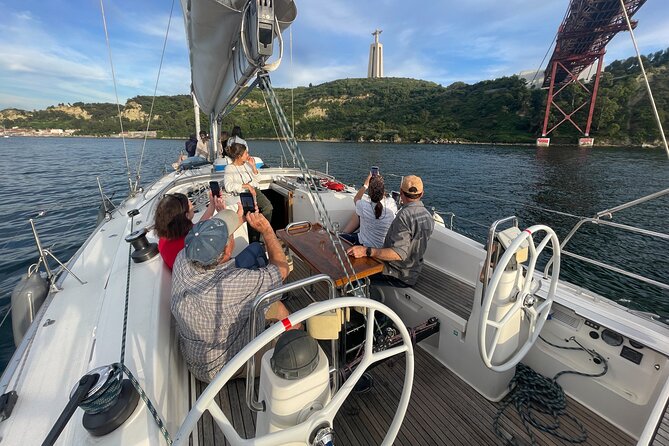 Sunset Boat Tour in Lisbon with Wine - Crossing the river toward Cacilhas and Cristo Rei