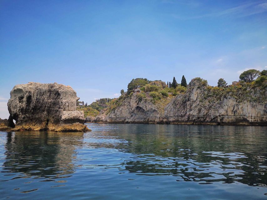 Taormina: Coastal Highlights Cruise with Wine & Food Tasting - Onboard tasting: local wines, liqueurs, and Etna-fed food