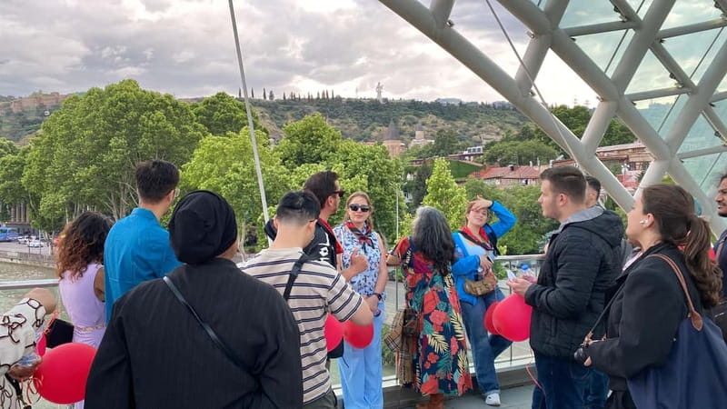 Tbilisi: Evening Walking Tour with Wine & Boat Ride Options - Bridge of Peace at night: LED bulbs, timing, and design detail