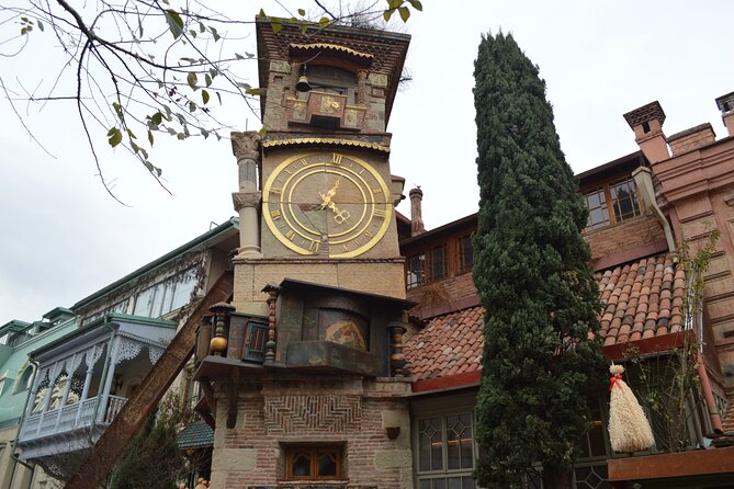 Tbilisi Old Town Walking Tour with a Local Guide - Rezo Gabriadze Marionette Theater: the clock tower and the play