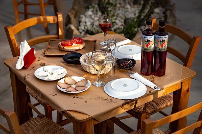 Tour and Wine Tasting in Mykonian Land - Wine Tasting That Feels Like a Meal, Not a Sniff-and-Rate Session