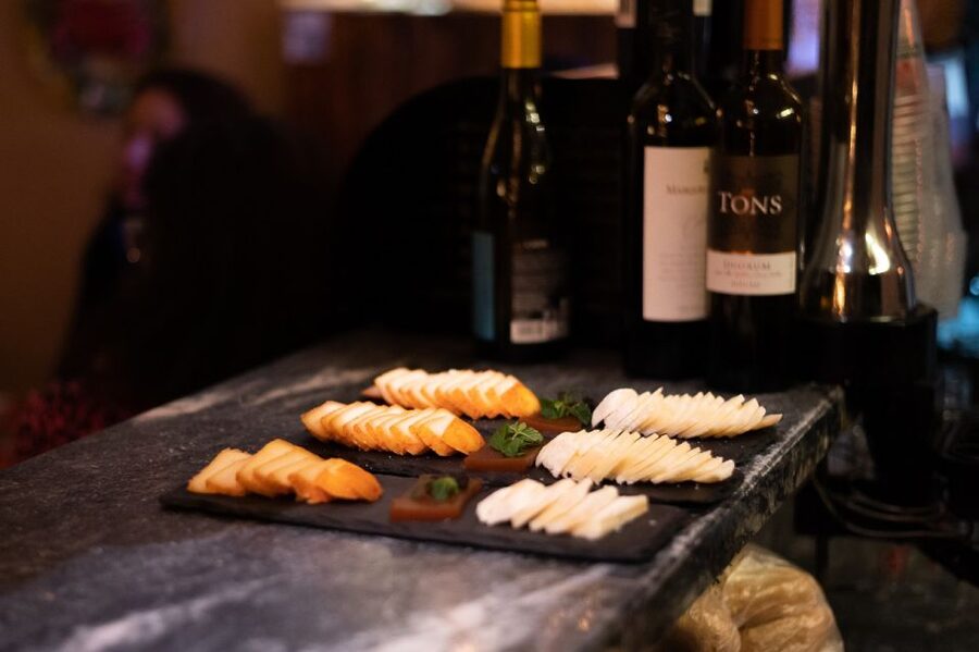 True Taste of Lisbon: Portuguese Tapas, Wine &Surprise Drink - Language, guide style, and what to watch on the day