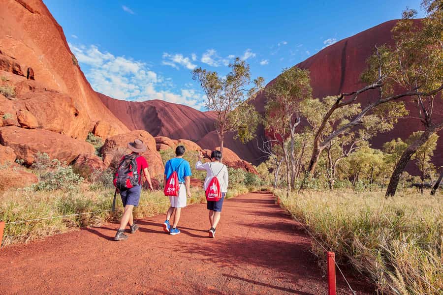 Uluru: Sacred Sites & Sunset Tour with Wine & Cheeseboard - Kuniya Walk and Mutitjulu Waterhole: why this stop has weight