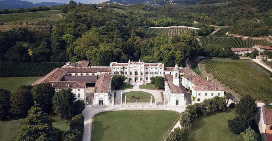 Valpolicella: Amarone Chateau Guided Tour and Wine Tasting - Walled vineyards and cellars: where the terroir shows up in stone