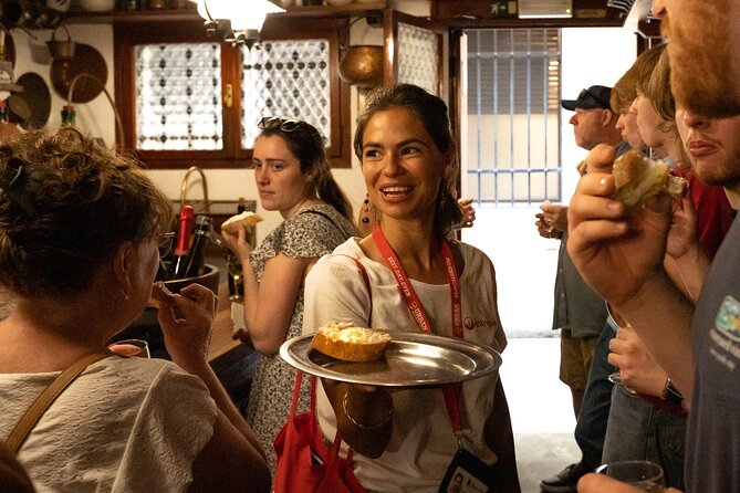 Venice Like a Local: Food, Wine & Spritz Tour with Traghetto Ride - Wine, spritz, and the sweet finale in Campo San Bortolomio
