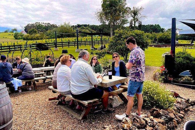Waiheke Island Wine Tour with Scenic Vineyards & Tastings - Two tour options: standard bus for more tastings vs vintage double-decker for scenery breaks