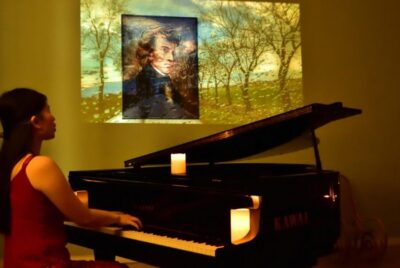 Warsaw Concert: Chopin – Painted by Candlelights with Wine - Inside Chopin Salon: seats, candlelight, and the wine moment