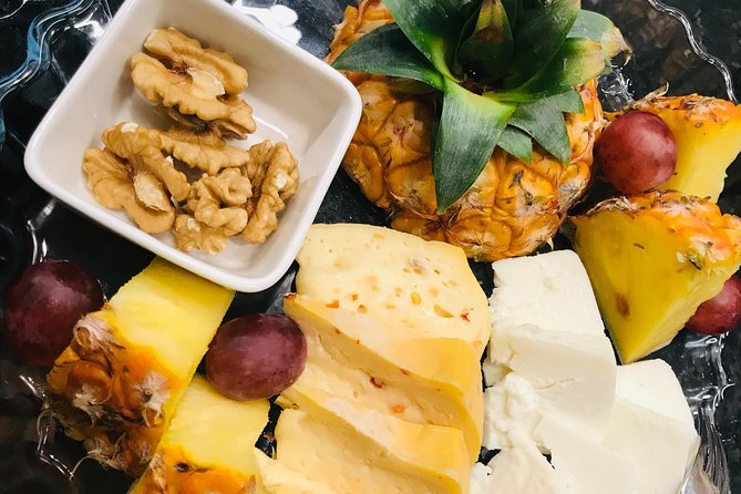 Wine & Food Evening Walking Tour in Ponta Delgada, incl. dinner - Comur: the food-shop stop that makes your next meal easier