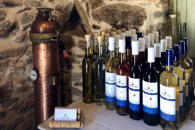 Wine Tasting and Tour in Saint Anna Winery in Naxos - The meze board: olives, tomatoes, cheeses, and olive oil
