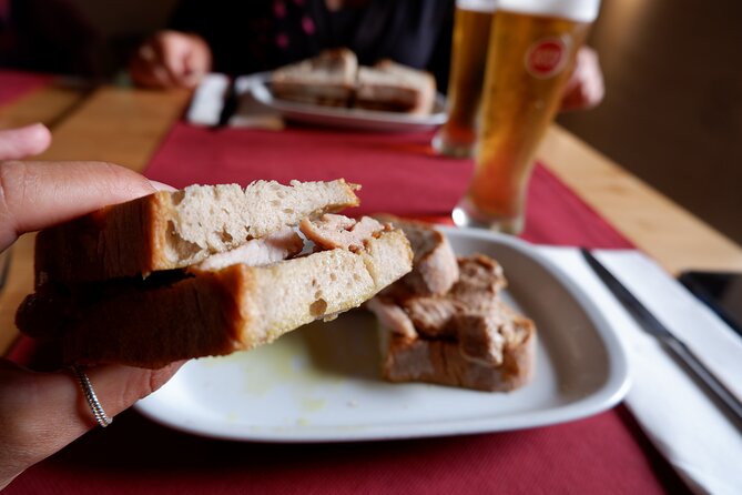Winner 2025 Undiscovered Lisbon Food & Wine Tour by Eating Europe - Seven tastings on five stops: what you’ll eat, bite by bite