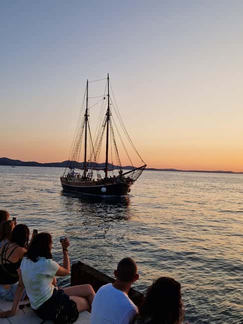 Zadar: Sunset Cruise on Traditional Boat with Wine - Music and atmosphere: social cruise energy, not a silent documentary