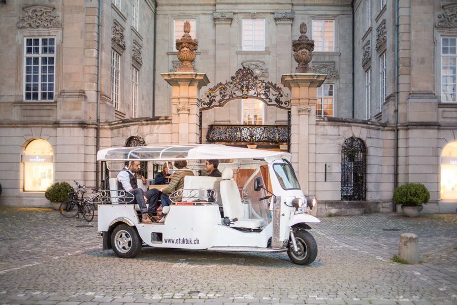 Zurich: Swiss Cheese Fondue & Wine e-Tuk-Tuk City Tour - eTukTuk + fondue: the smart way to see Zurich in 90 minutes